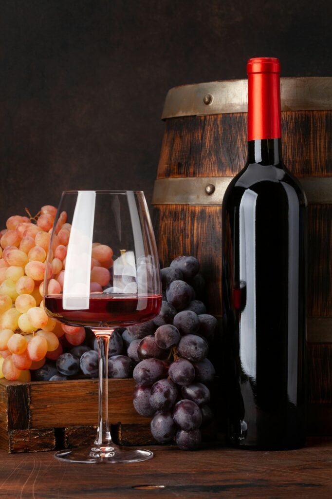 wine bottle grapes glass of wine jpg